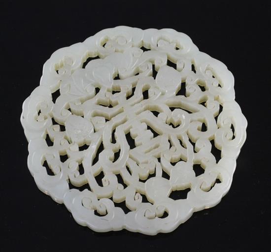 A Chinese celadon jade plaque, 19th century, 7.4cm